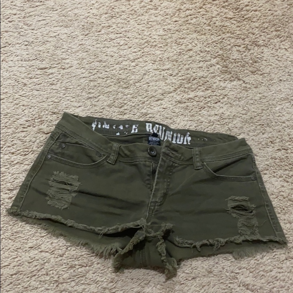 Army green distressed denim shorts with pockets
